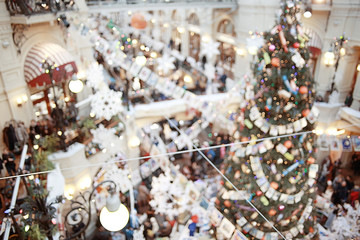 Fototapeta na wymiar Christmas tree lights blurred background New Year toy