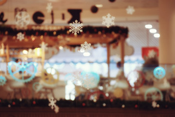 Fototapeta na wymiar Christmas ornaments snowflake background blur city