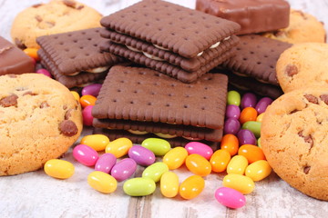 Heap of colorful candies and cookies, too many sweets