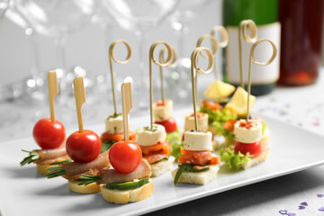 Assorted canapes on table closeup