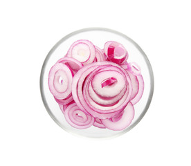 Sliced onion in bowl on white background