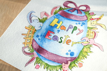 Beautiful Easter greeting card on wooden surface, closeup