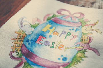 Beautiful Easter greeting card on wooden table, closeup
