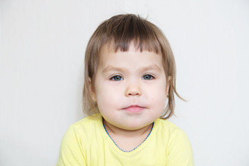 Fototapeta premium little girl portrait smiling closeup with dark blond hair