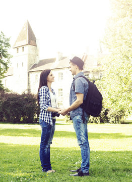 Young travelling couple hanging out together