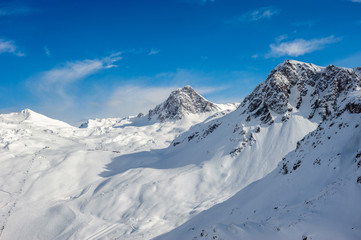 Fototapeta na wymiar Alpine winter mountain landscape. French Alps with snow.