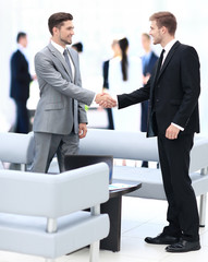 Fototapeta premium Business people shaking hands during a meeting