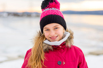 Young girl on the frozen lake