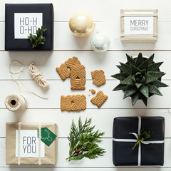 Elegant nordic retro christmas, wrapping station, desk view from above, DIY xmas concept