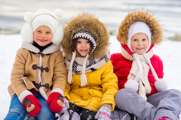 Group of young girls on the frozen lake