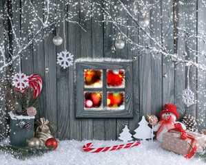 Christmas interior with snowman, window, decorative branches, pr