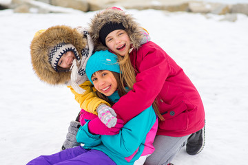 Group of young girls on the frozen lake