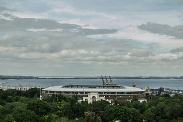 Odessa, Ukraine - 19 of June 2015: Chernomorets stadium, seen from Ferris wheel at cloudy day