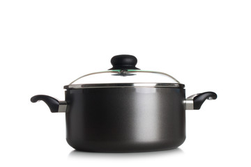 Stainless pan with open up glass cover isolated on a white backg