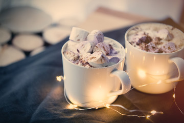 Two Cups of hot chocolate with murshmallows