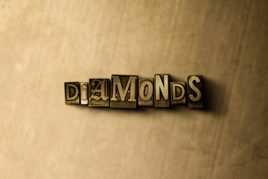 DIAMONDS - close-up of grungy vintage typeset word on metal backdrop. Royalty free stock - 3D rendered stock image.  Can be used for online banner ads and direct mail.