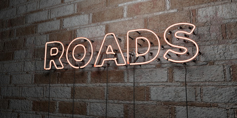 ROADS - Glowing Neon Sign on stonework wall - 3D rendered royalty free stock illustration.  Can be used for online banner ads and direct mailers..