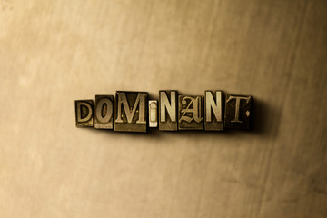 DOMINANT - close-up of grungy vintage typeset word on metal backdrop. Royalty free stock - 3D rendered stock image.  Can be used for online banner ads and direct mail.