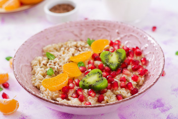 Tasty and healthy oatmeal porridge with fruit, berry and flax seeds. Healthy breakfast. Fitness food. Proper nutrition. Breakfast on Valentine's Day.