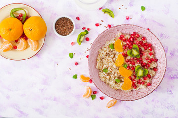 Tasty and healthy oatmeal porridge with fruit, berry and flax seeds. Healthy breakfast. Fitness food. Proper nutrition. Breakfast on Valentine's Day. Top view. Flat lay