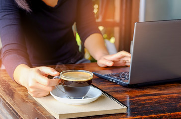 Fototapeta na wymiar Business people working laptop with coffee on table.