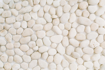 Neutral pattern of beige stones. Flat lay, top view