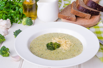 Creamy soup puree with broccoli and green peas