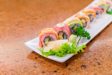 sushi roll with fresh wasabi on white plate
