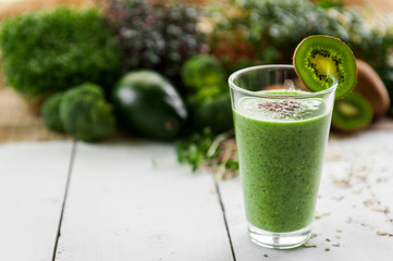 fresh and tasty green smoothie with ingredients
