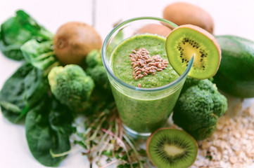 fresh and tasty green smoothie with ingredients
