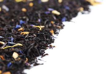 Heap of dry tea on white background