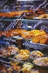 Showcase a wide range of different confectionery products in the sales area, close-up.