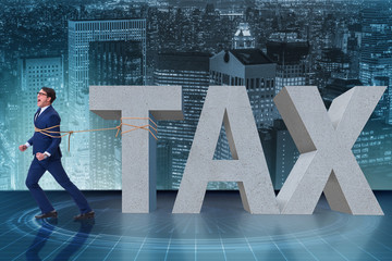 Businessman suffering from high taxes