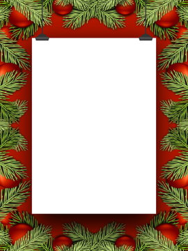 Blank frame hanged by clips against red background enclosed by red Christmas ornaments and leaves