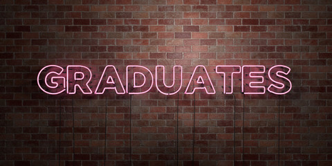 GRADUATES - fluorescent Neon tube Sign on brickwork - Front view - 3D rendered royalty free stock picture. Can be used for online banner ads and direct mailers..
