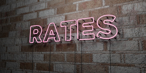 RATES - Glowing Neon Sign on stonework wall - 3D rendered royalty free stock illustration.  Can be used for online banner ads and direct mailers..