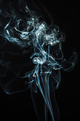 Blue smoke abstract on a dark background