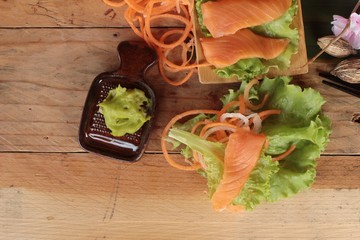 Salmon raw sashimi with wasabi , Japanese food style.