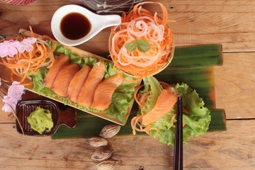 Salmon raw sashimi with wasabi , Japanese food style.