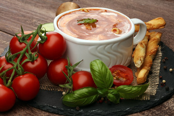 fresh tomato soup in a white bowl 