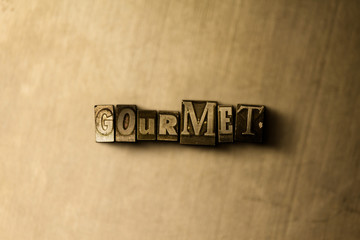 GOURMET - close-up of grungy vintage typeset word on metal backdrop. Royalty free stock - 3D rendered stock image.  Can be used for online banner ads and direct mail.