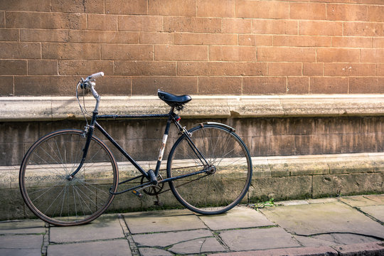 Vintage old bicycle against the wall