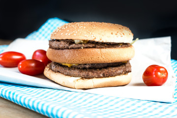 delicious American cheese burger with tomato