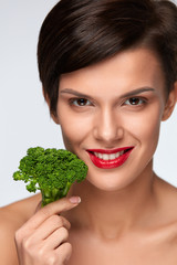 Diet. Beautiful Smiling Woman With Green Broccoli, Healthy Food