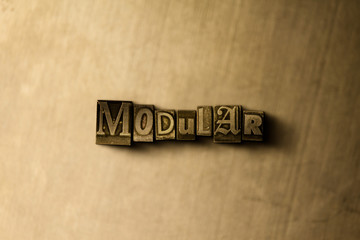MODULAR - close-up of grungy vintage typeset word on metal backdrop. Royalty free stock - 3D rendered stock image.  Can be used for online banner ads and direct mail.