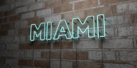 MIAMI - Glowing Neon Sign on stonework wall - 3D rendered royalty free stock illustration.  Can be used for online banner ads and direct mailers..