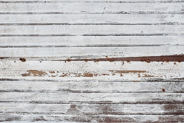 The corrugated sheet is white with rust closeup