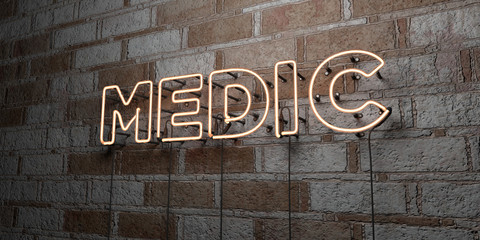 MEDIC - Glowing Neon Sign on stonework wall - 3D rendered royalty free stock illustration.  Can be used for online banner ads and direct mailers..