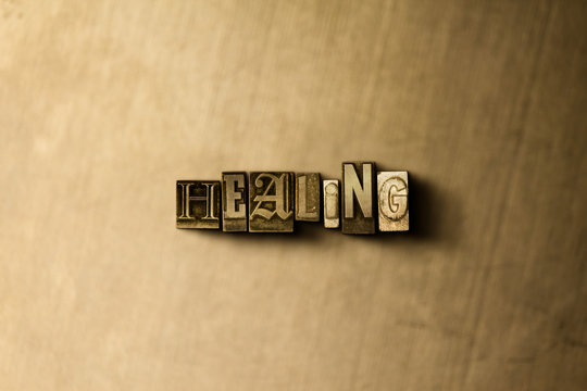 HEALING - close-up of grungy vintage typeset word on metal backdrop. Royalty free stock - 3D rendered stock image.  Can be used for online banner ads and direct mail.