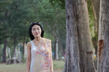 Portrait of beautiful young asian woman with scarf summer vacati